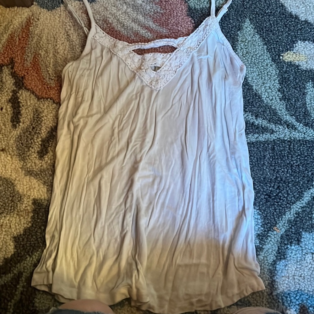 Maurice’s white undershirt
